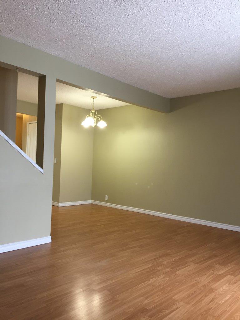 Fully-Renovated 3-Bedroom Family-Friendly Townhome + BONUS Basement Development! - Thumbnail 2