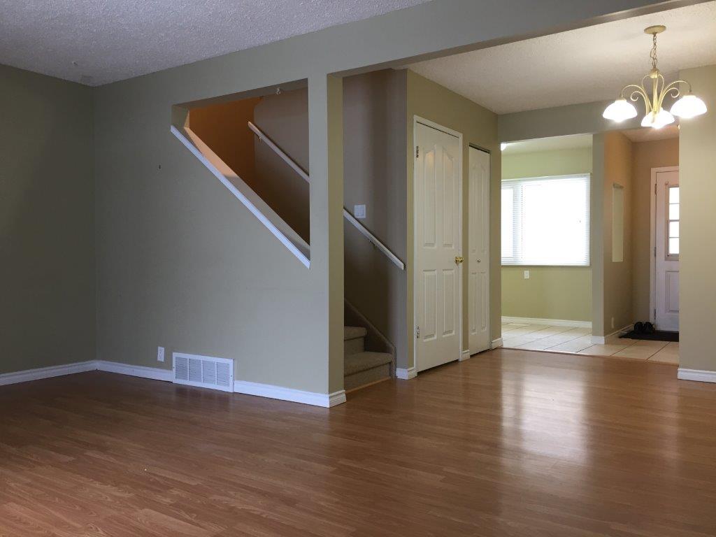 Fully-Renovated 3-Bedroom Family-Friendly Townhome + BONUS Basement Development! - Image 1