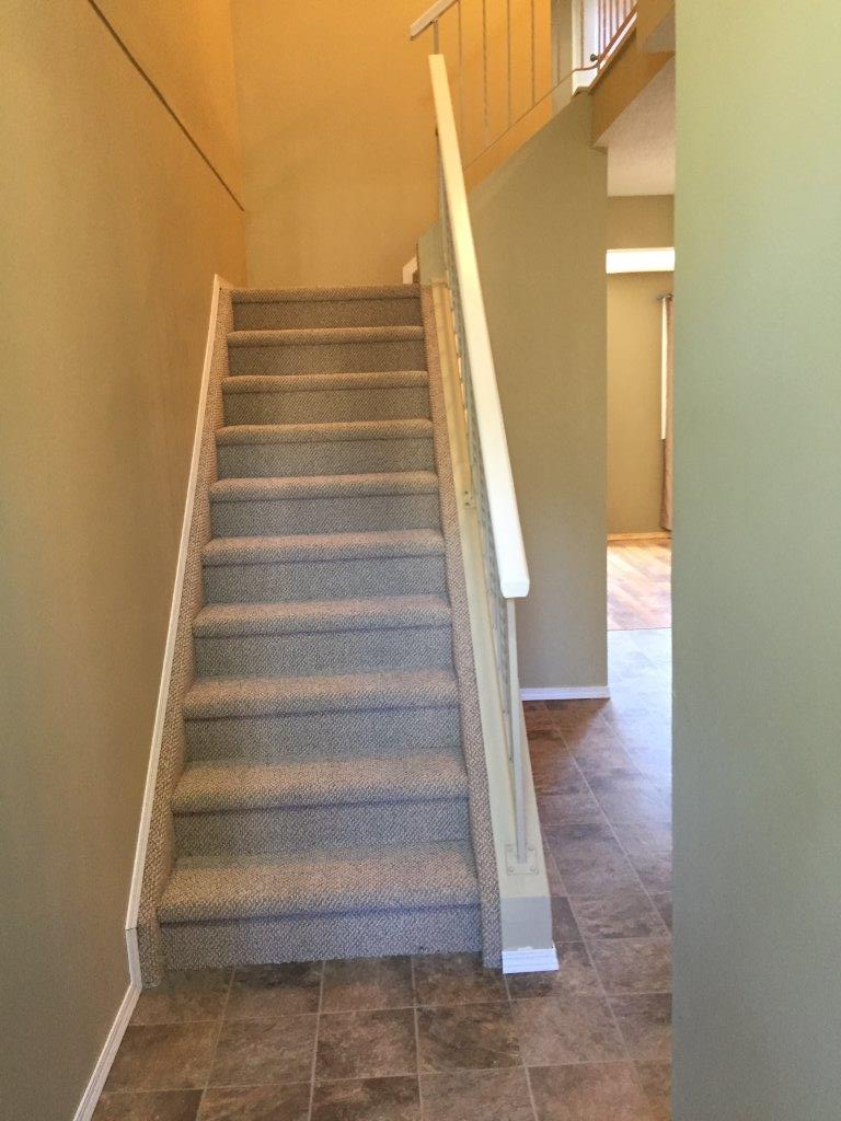 You'll LOVE this Smartly Upgraded Townhome ~ 6 Appliances & Great Basement Development! - Thumbnail 2
