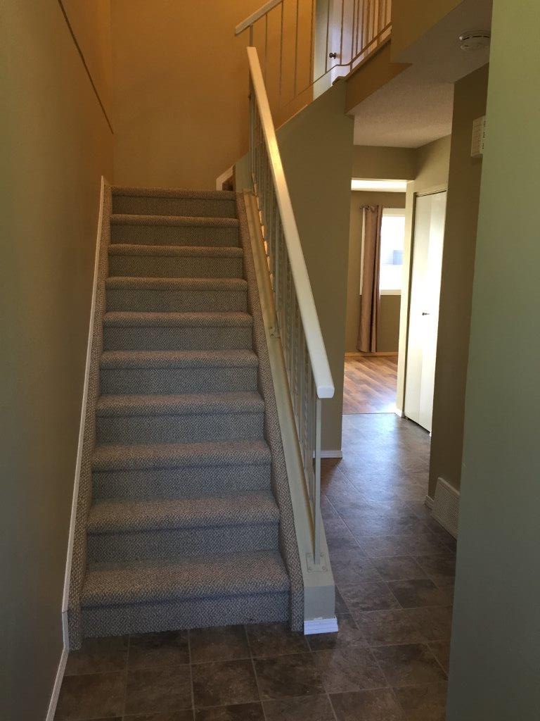 You'll LOVE this Smartly Upgraded Townhome ~ 6 Appliances & Great Basement Development! - Thumbnail 3